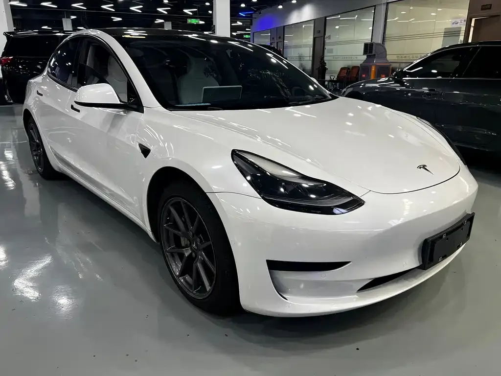 Tesla Model 3 — фото 6