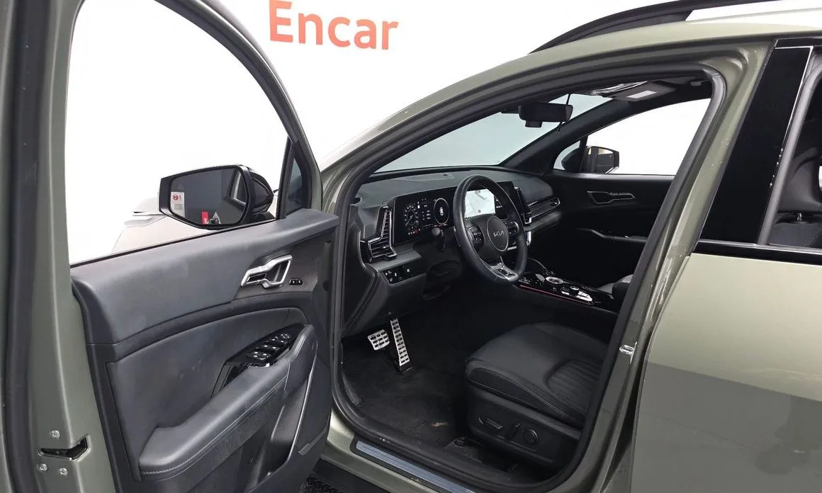 Kia Sportage — фото 9