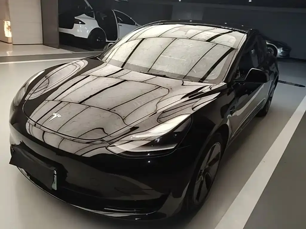 Tesla Model 3 — фото 9
