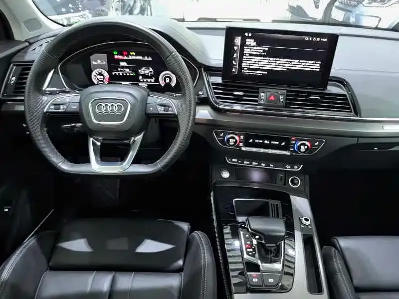 Audi Q5L — фото 10
