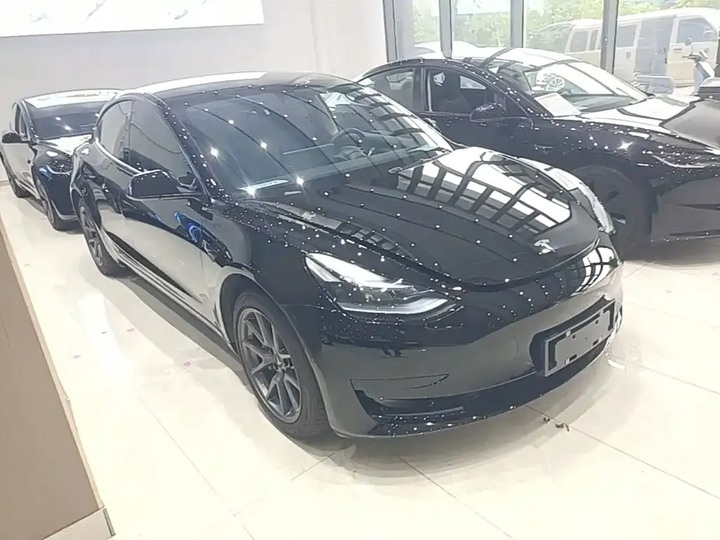 Tesla Model 3 — фото 9
