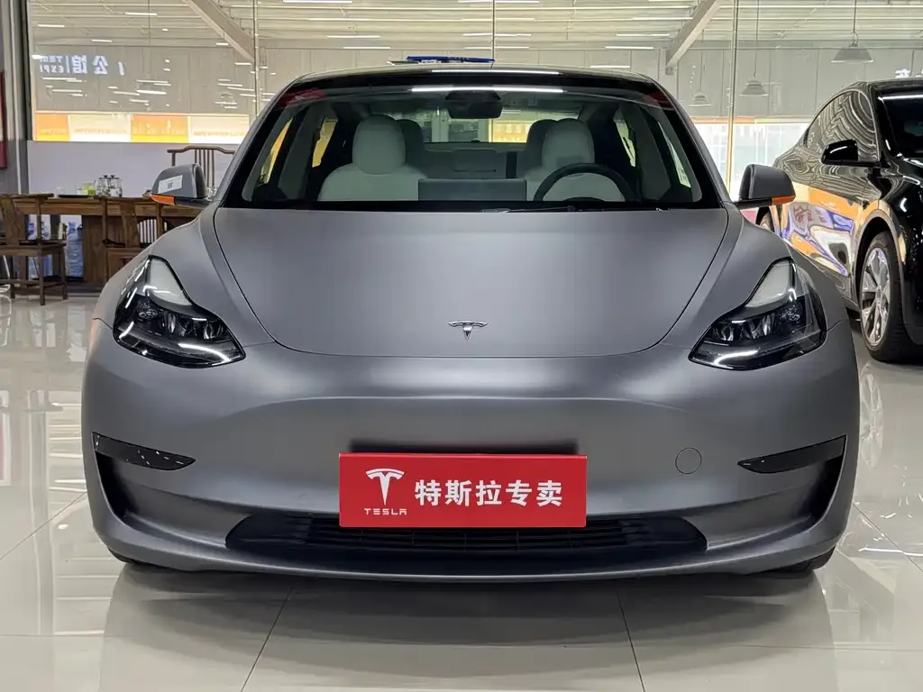 Tesla Model 3 — фото 7