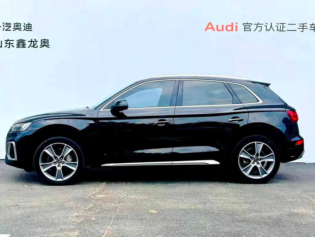 Audi Q5L — фото 6