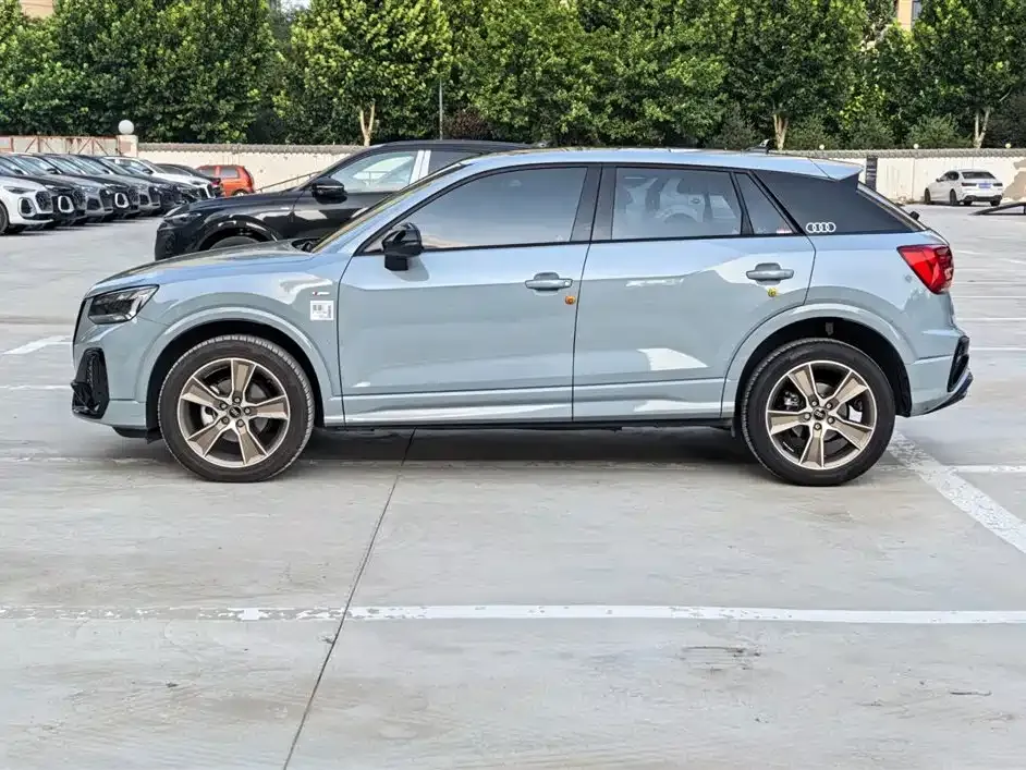 Audi Q2L — фото 7