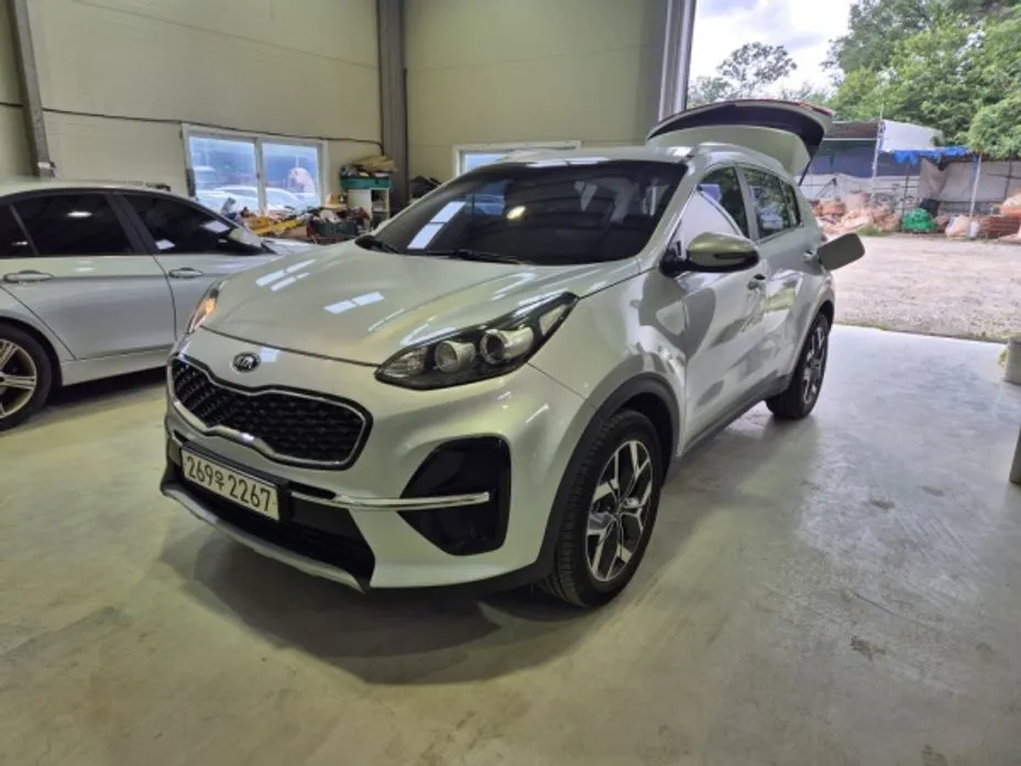 Kia Sportage — фото 1