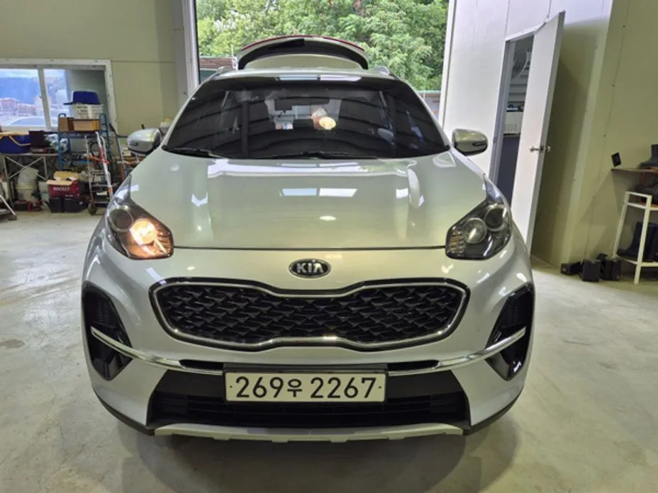 Kia Sportage — фото 8