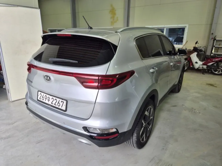 Kia Sportage — фото 7