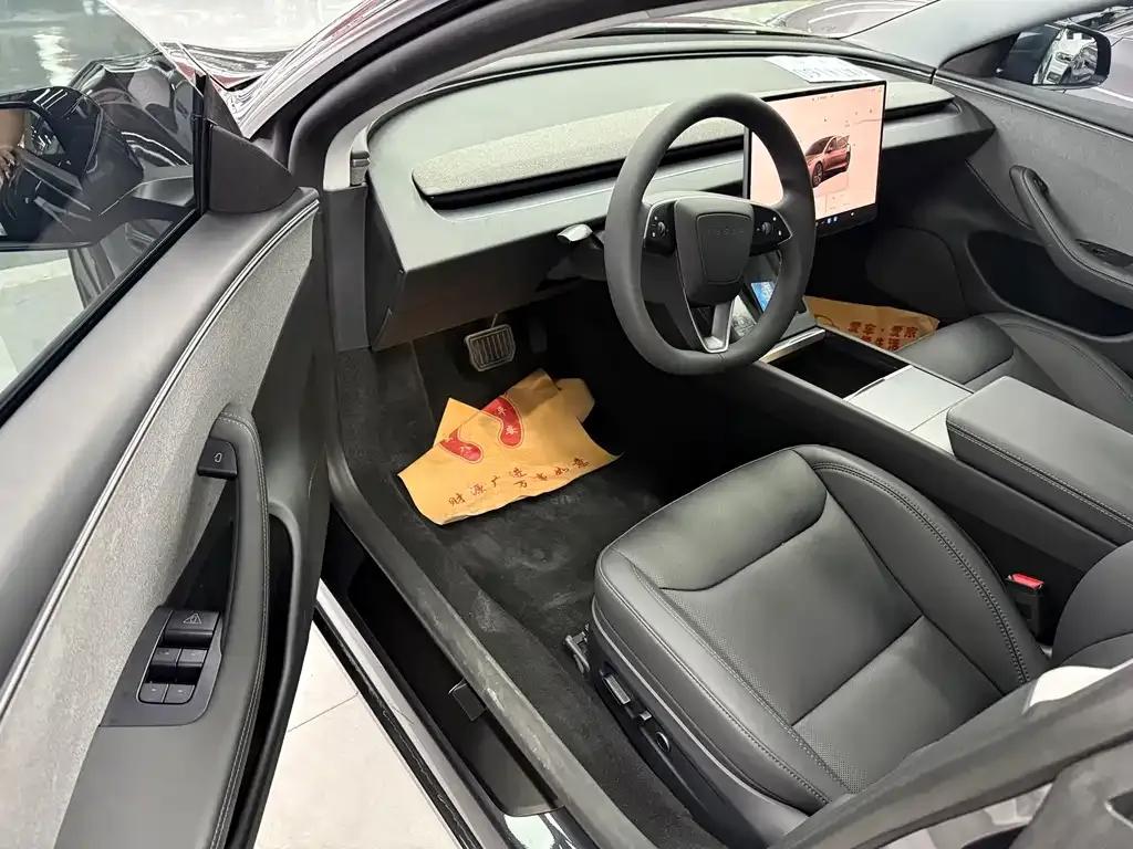 Tesla Model 3 — фото 10
