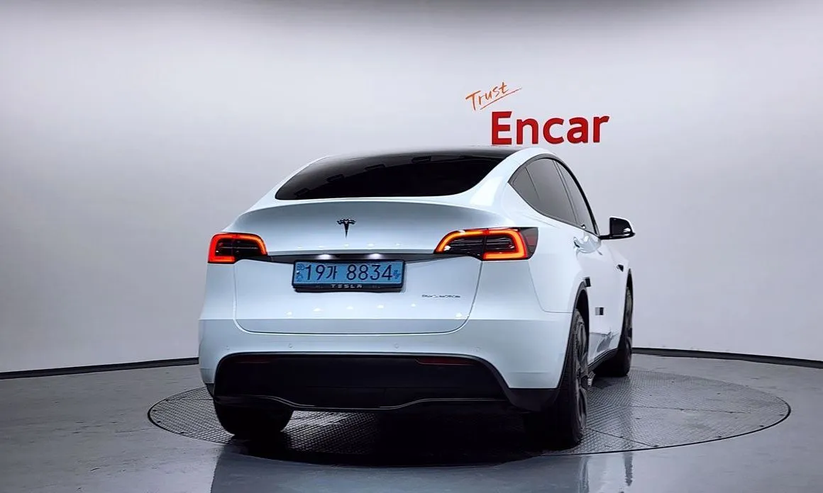 Tesla Model Y — фото 7
