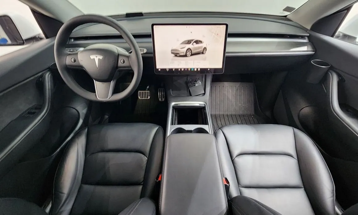 Tesla Model Y — фото 9