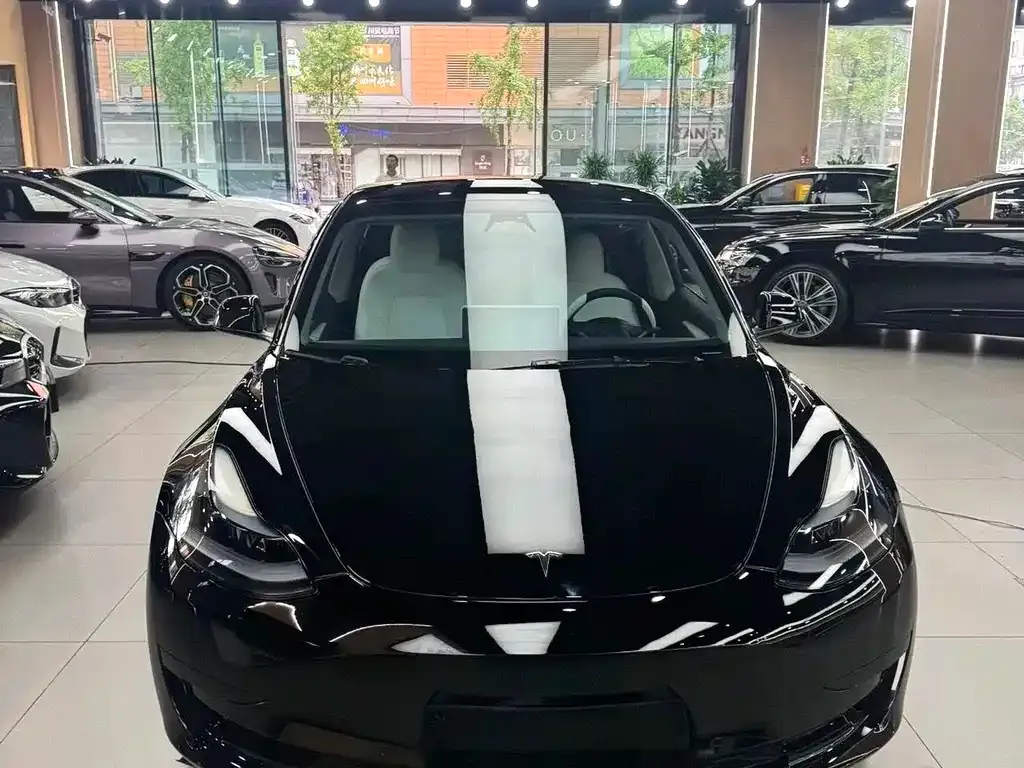 Tesla Model 3 — фото 7