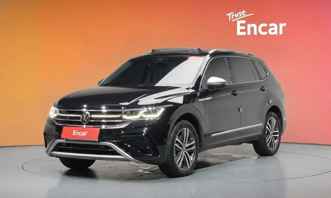 Volkswagen Tiguan — фото 1