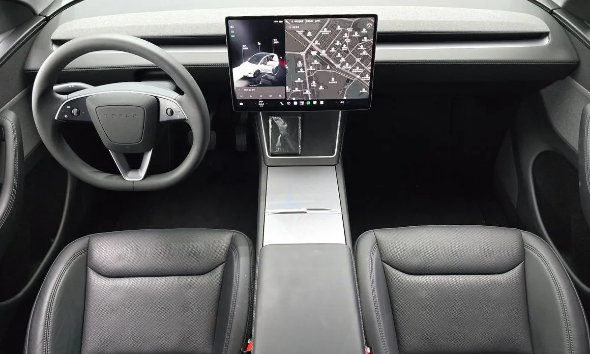 Tesla Model Y — фото 7