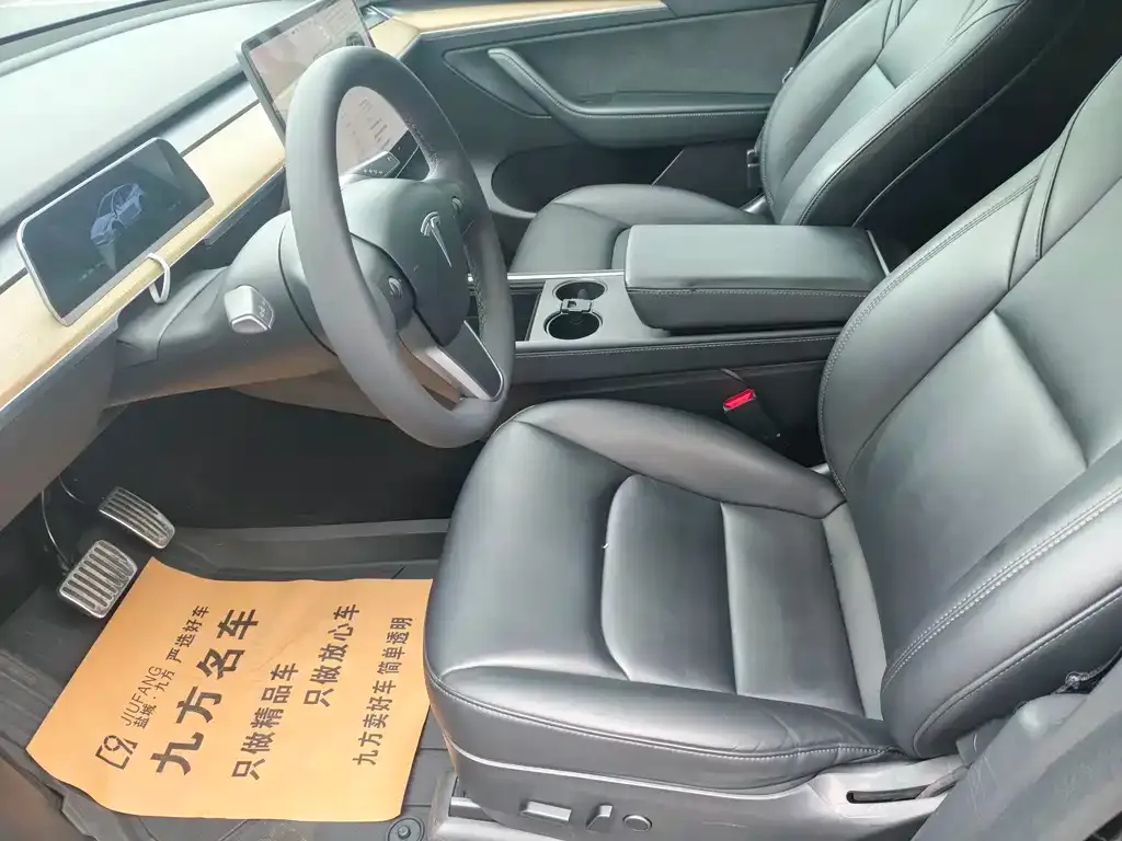 Tesla Model Y — фото 10