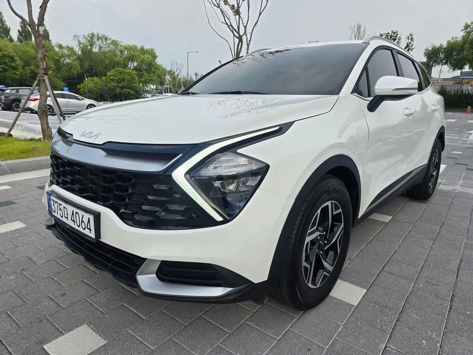 Kia Sportage — фото 1
