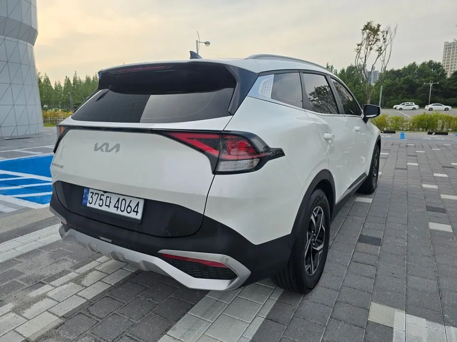 Kia Sportage — фото 7