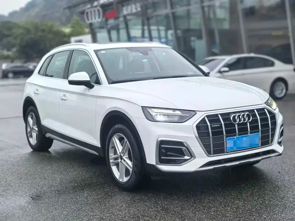 Audi Q5L — фото 7