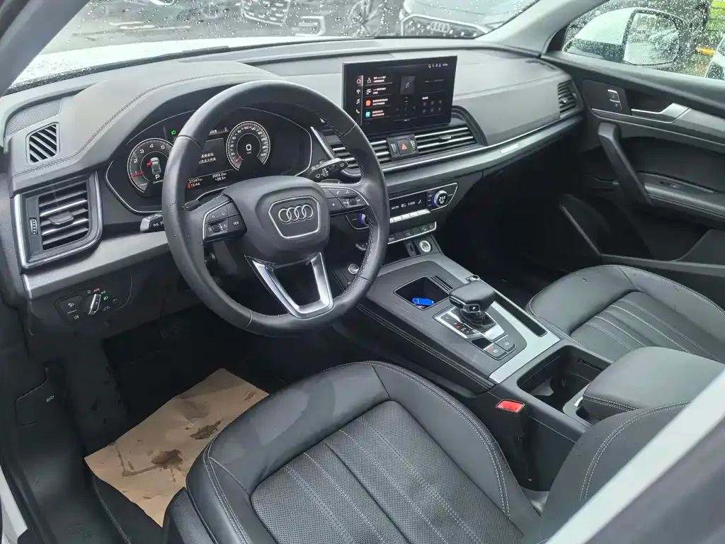 Audi Q5L — фото 10