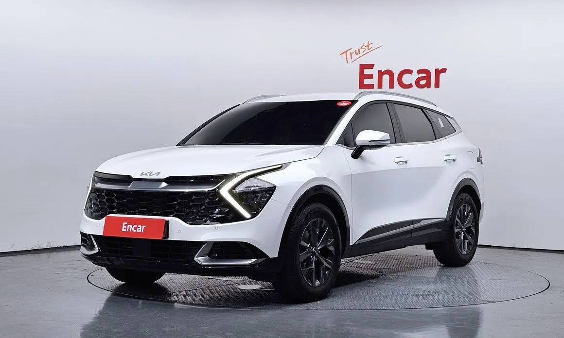 Kia Sportage — фото 1