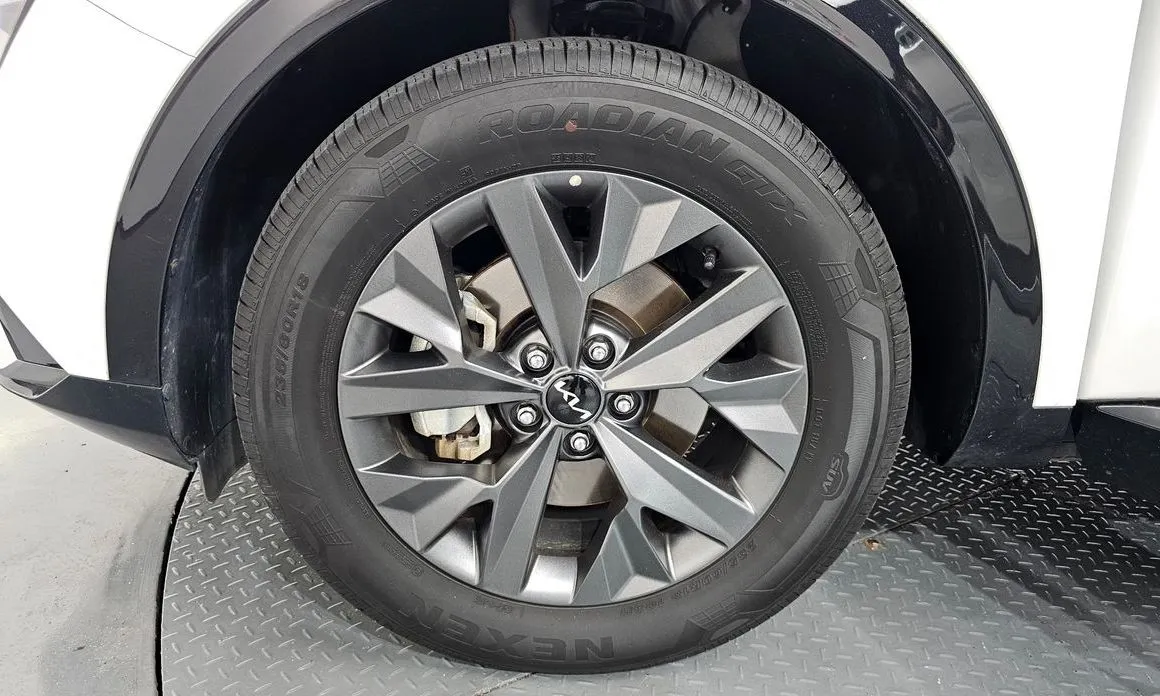 Kia Sportage — фото 9