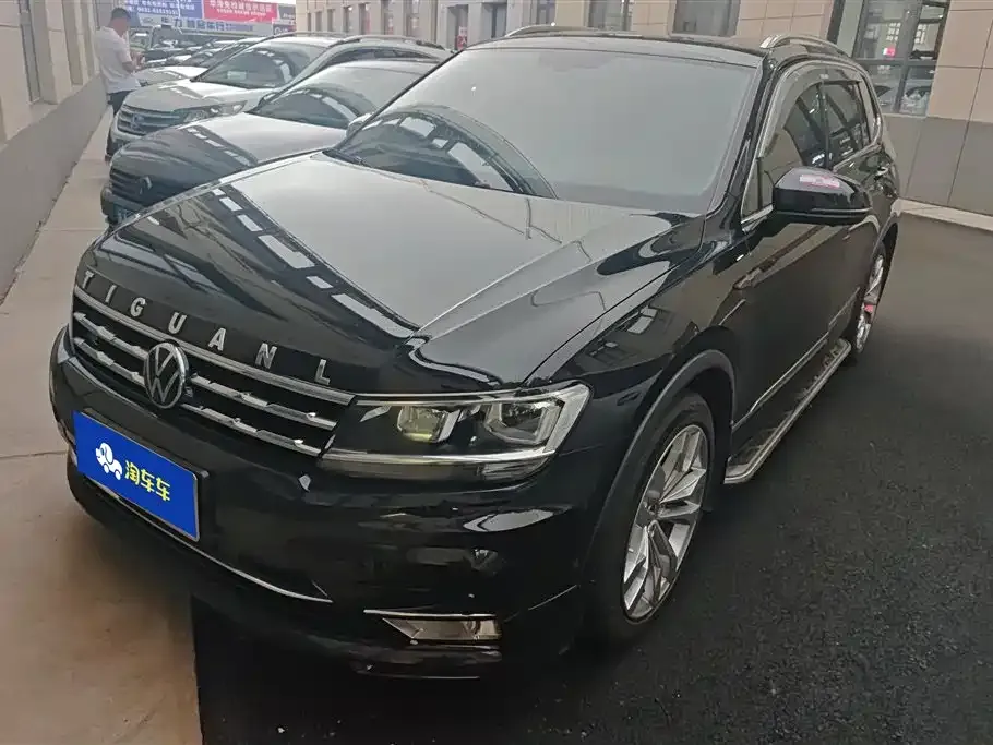 Volkswagen Tiguan L — фото 1