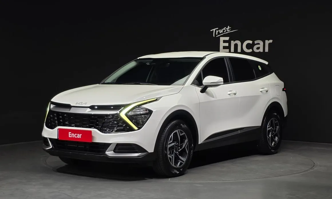 Kia Sportage — фото 1