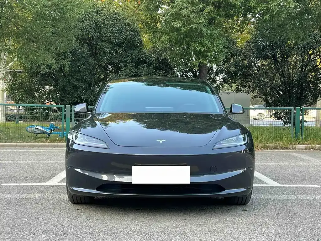 Tesla Model 3 — фото 7