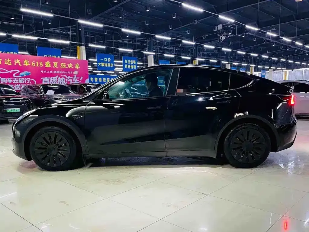 Tesla Model Y — фото 7