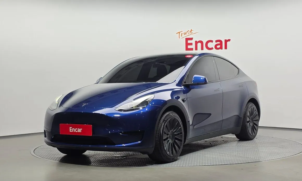Tesla Model Y — фото 1
