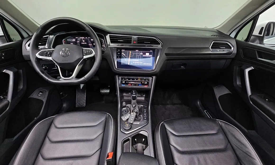 Volkswagen Tiguan — фото 7
