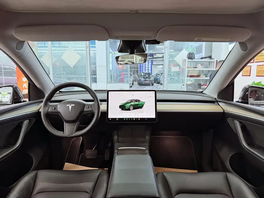 Tesla Model Y — фото 7