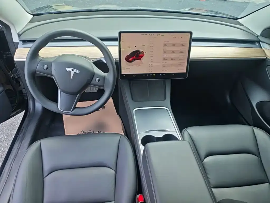 Tesla Model 3 — фото 8