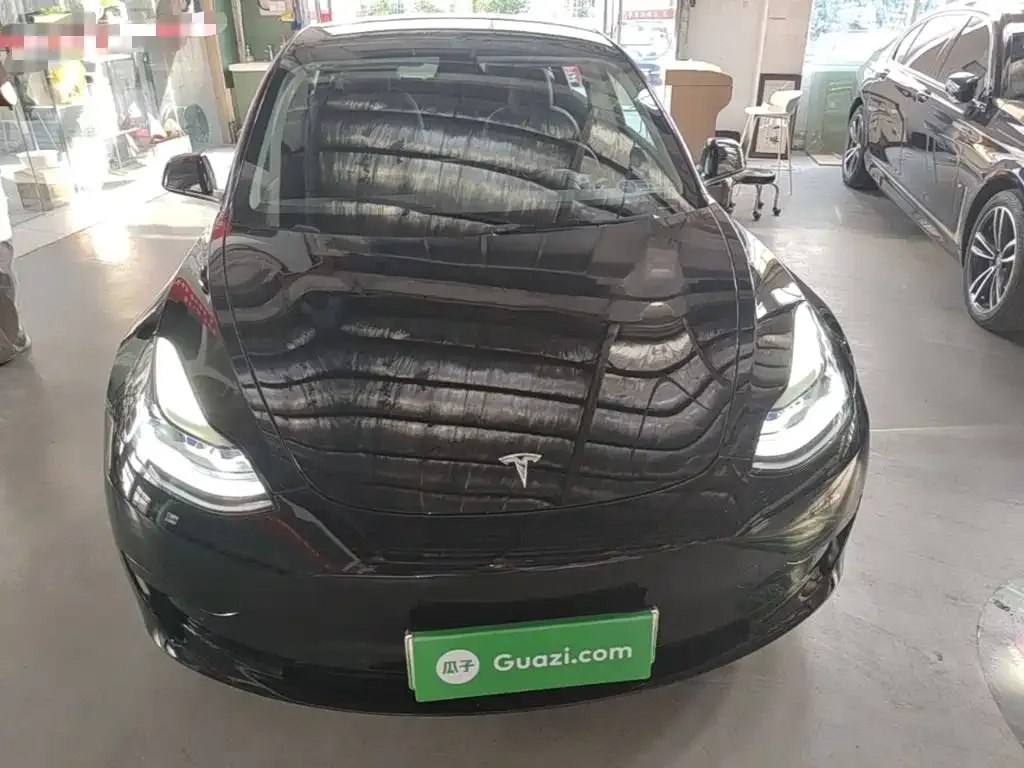 Tesla Model 3 — фото 10