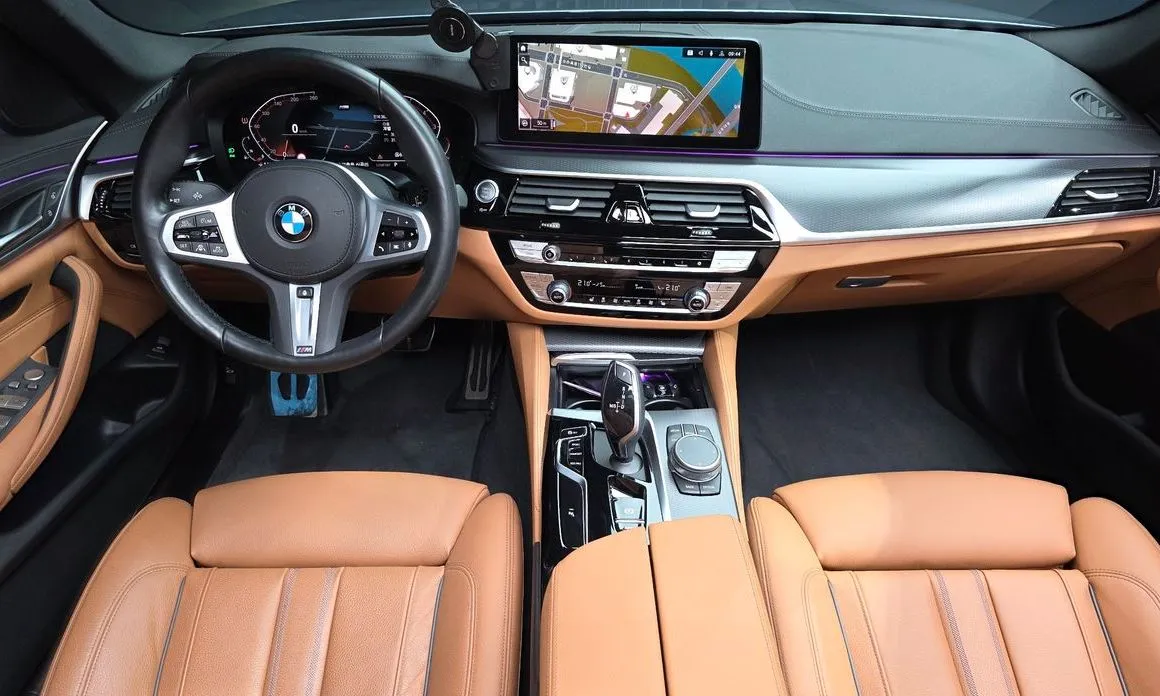 BMW 5-Series — фото 10