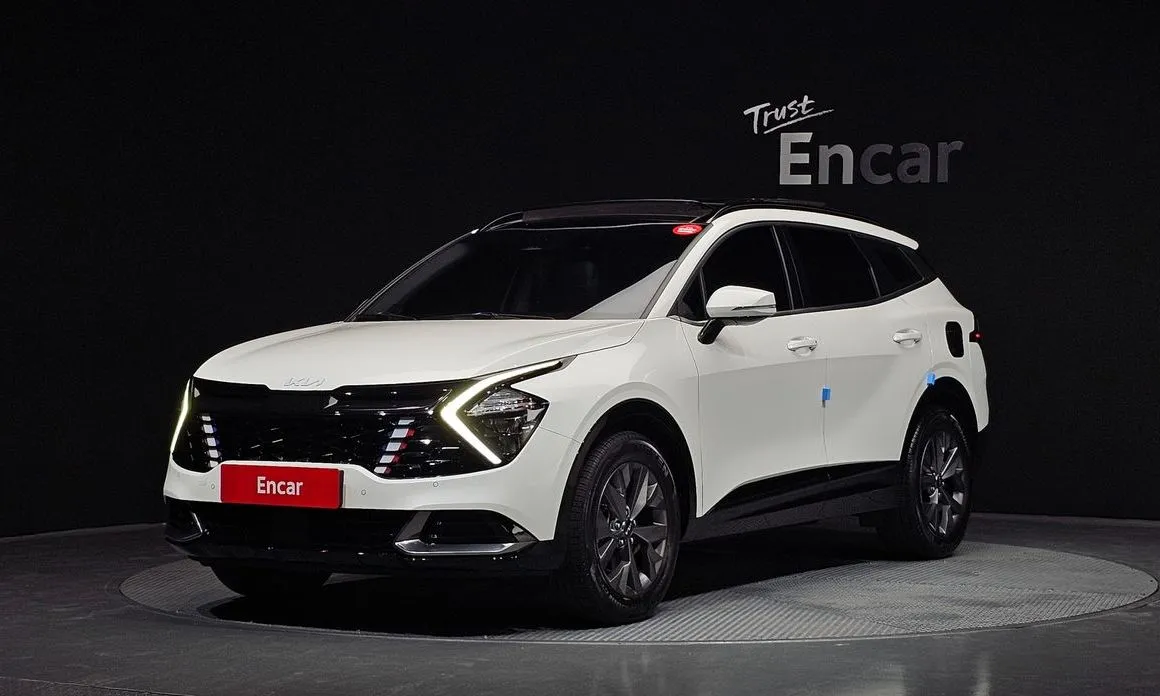 Kia Sportage — фото 1