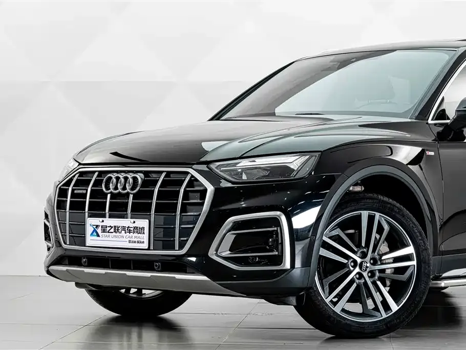 Audi Q5L — фото 6