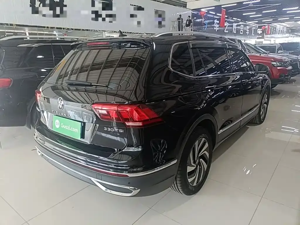 Volkswagen Tiguan L — фото 10