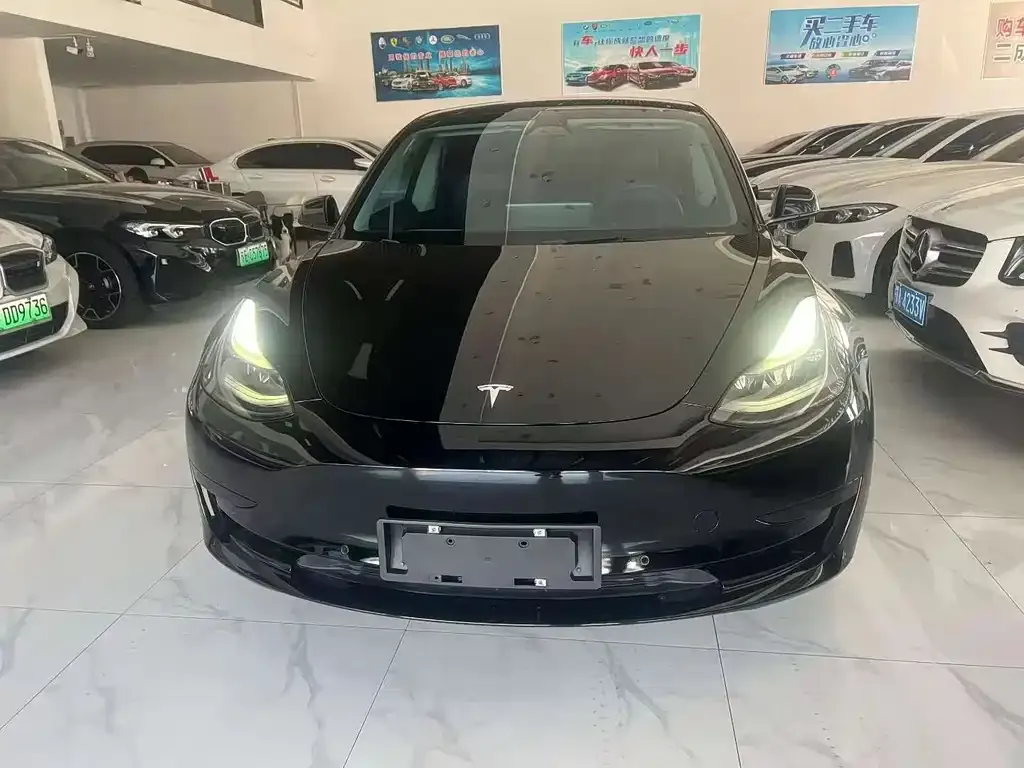 Tesla Model 3 — фото 7