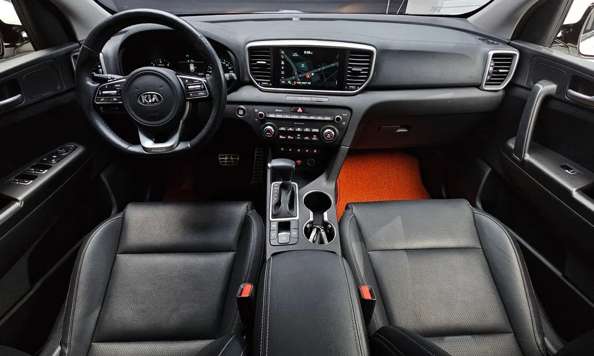 Kia Sportage — фото 10