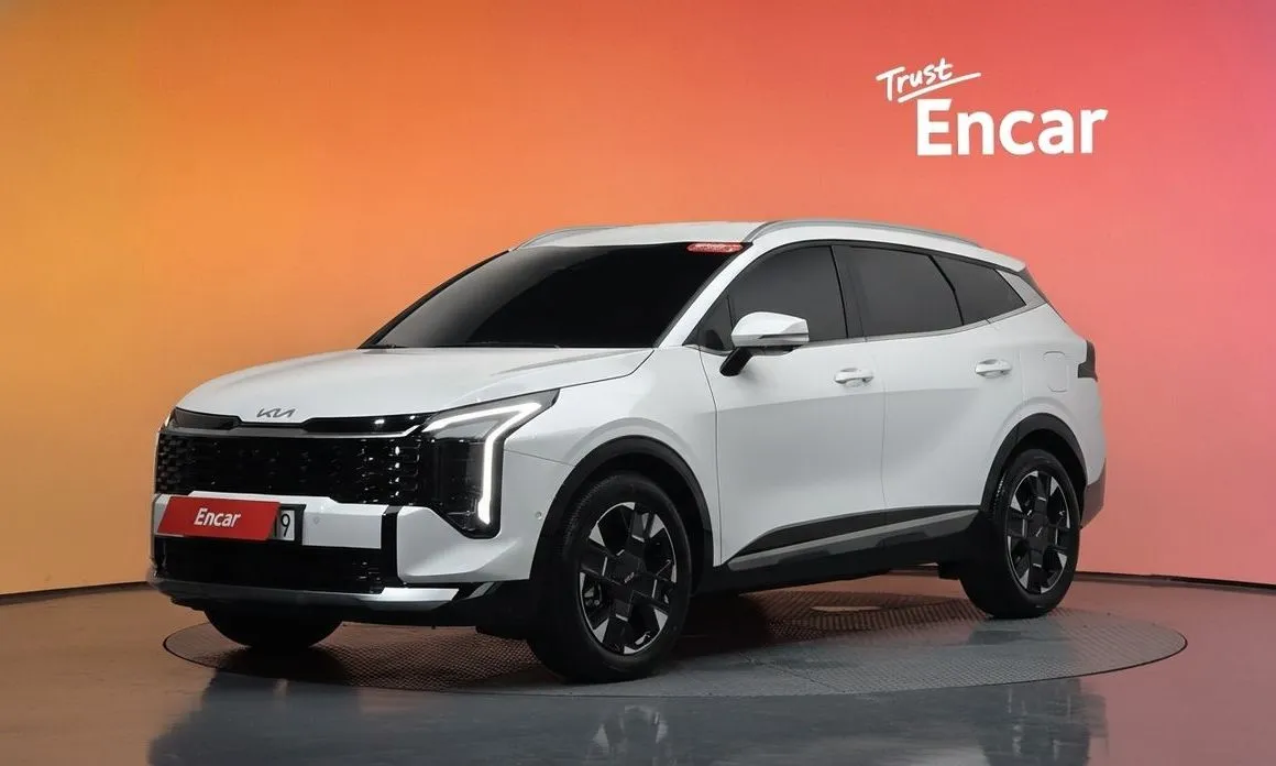 Kia Sportage — фото 1