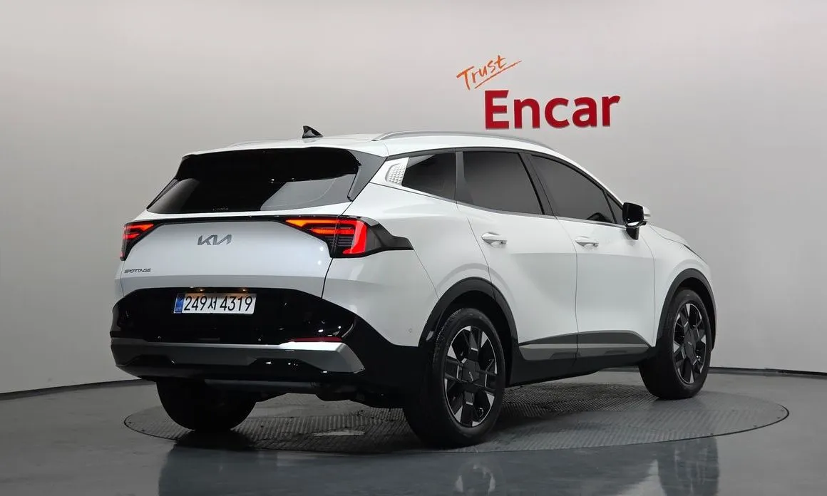 Kia Sportage — фото 9