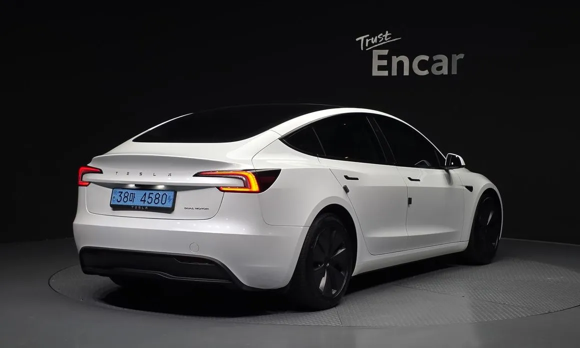 Tesla Model 3 — фото 7