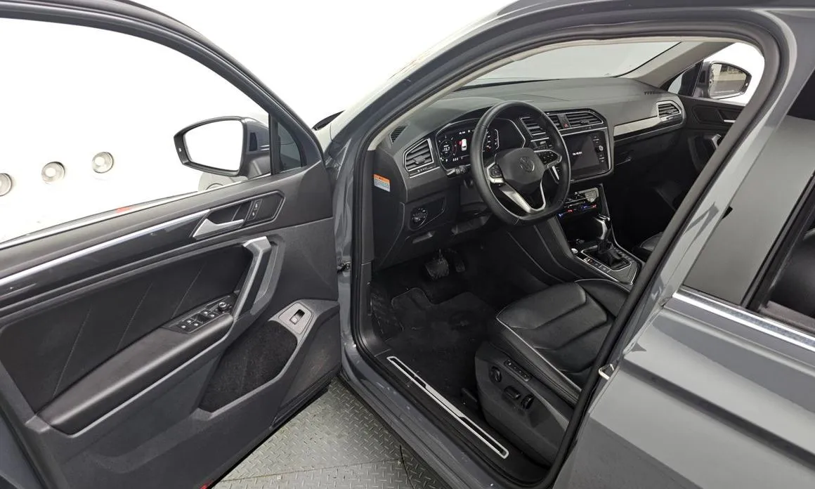 Volkswagen Tiguan — фото 8
