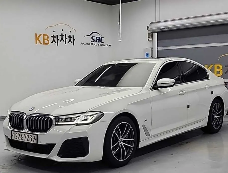 BMW 5-Series — фото 1
