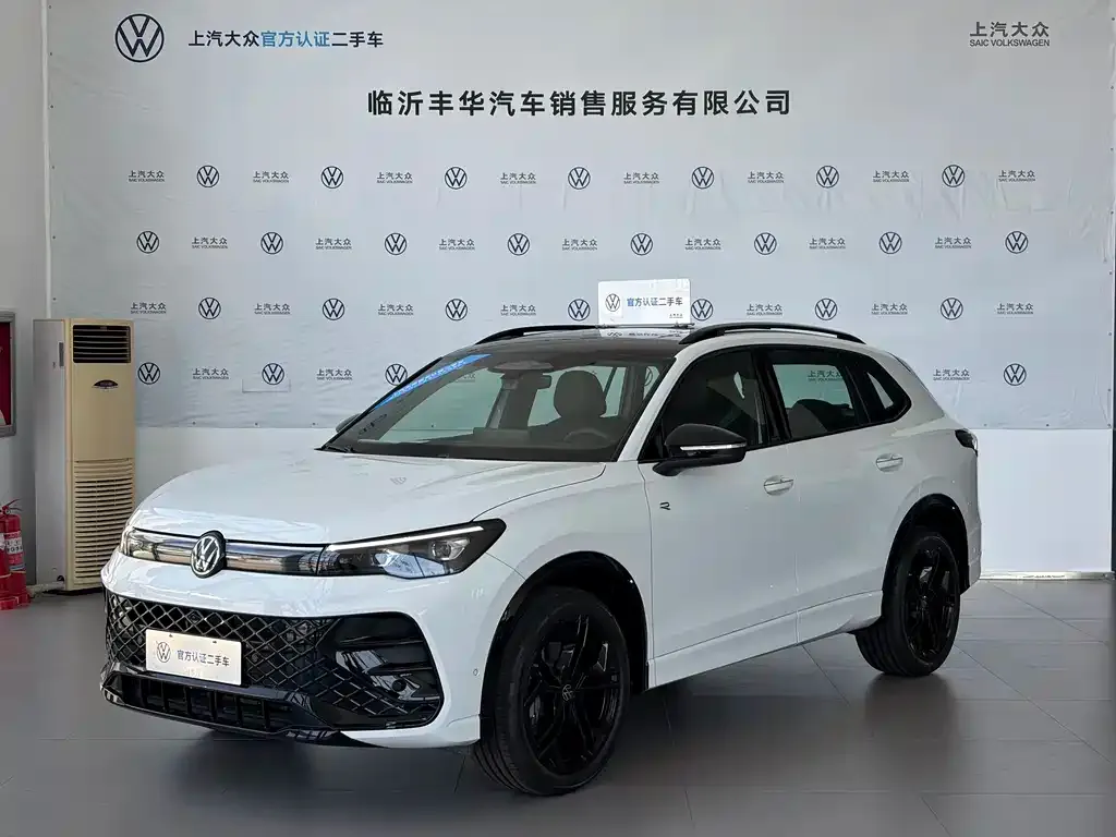 Volkswagen Tiguan L — фото 1
