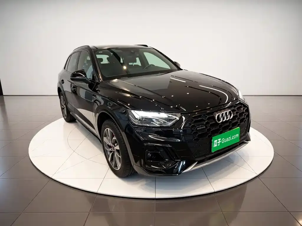 Audi Q5L — фото 10