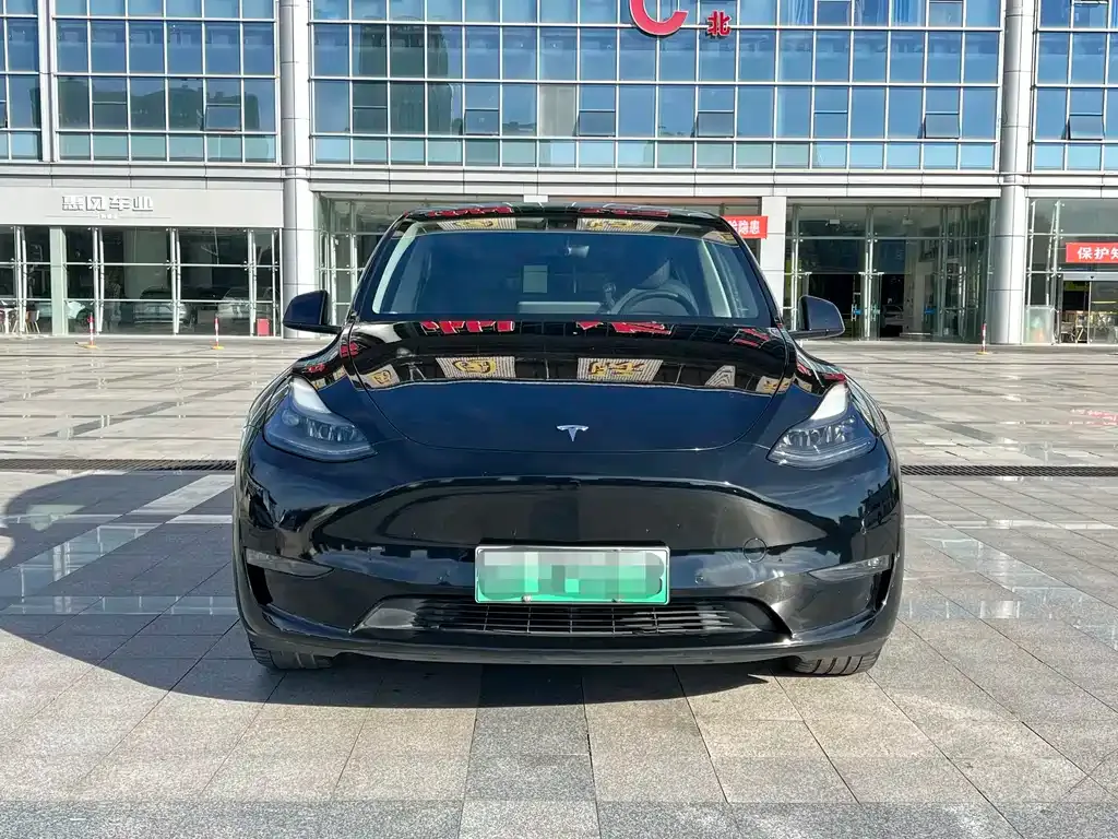 Tesla Model Y — фото 8