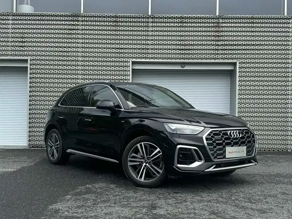 Audi Q5L — фото 9