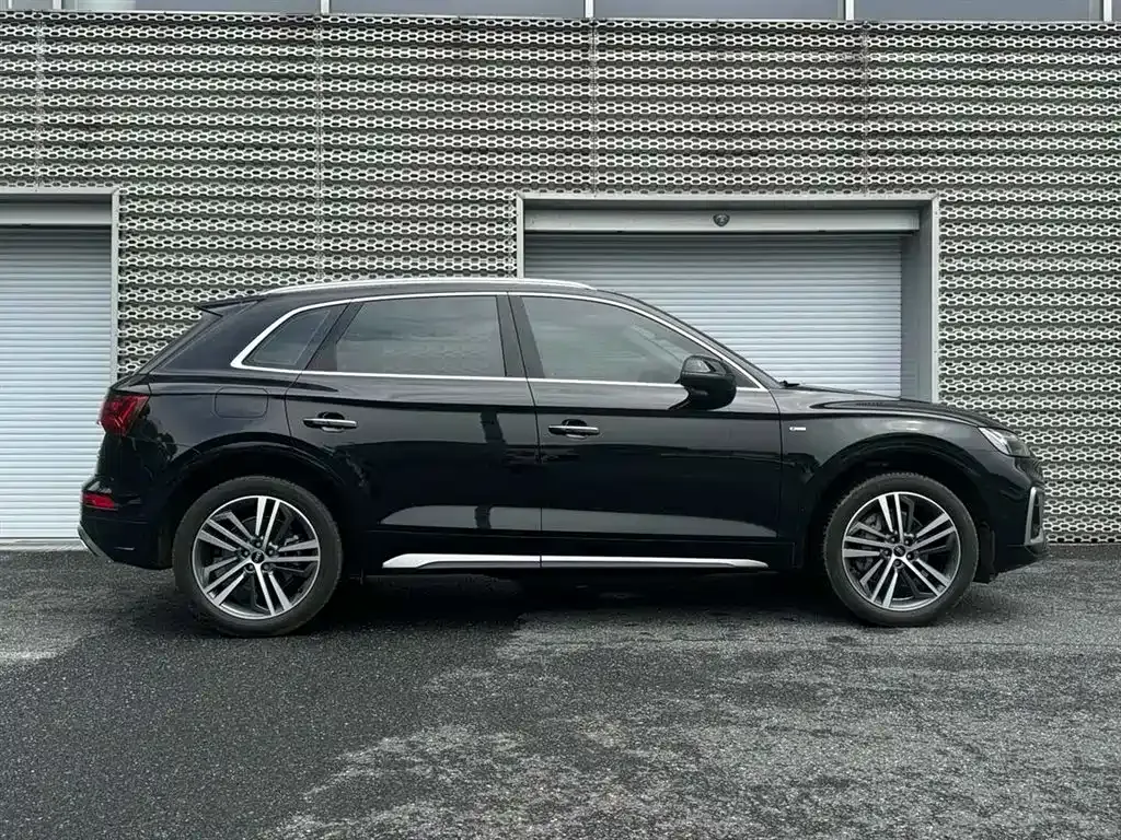 Audi Q5L — фото 5
