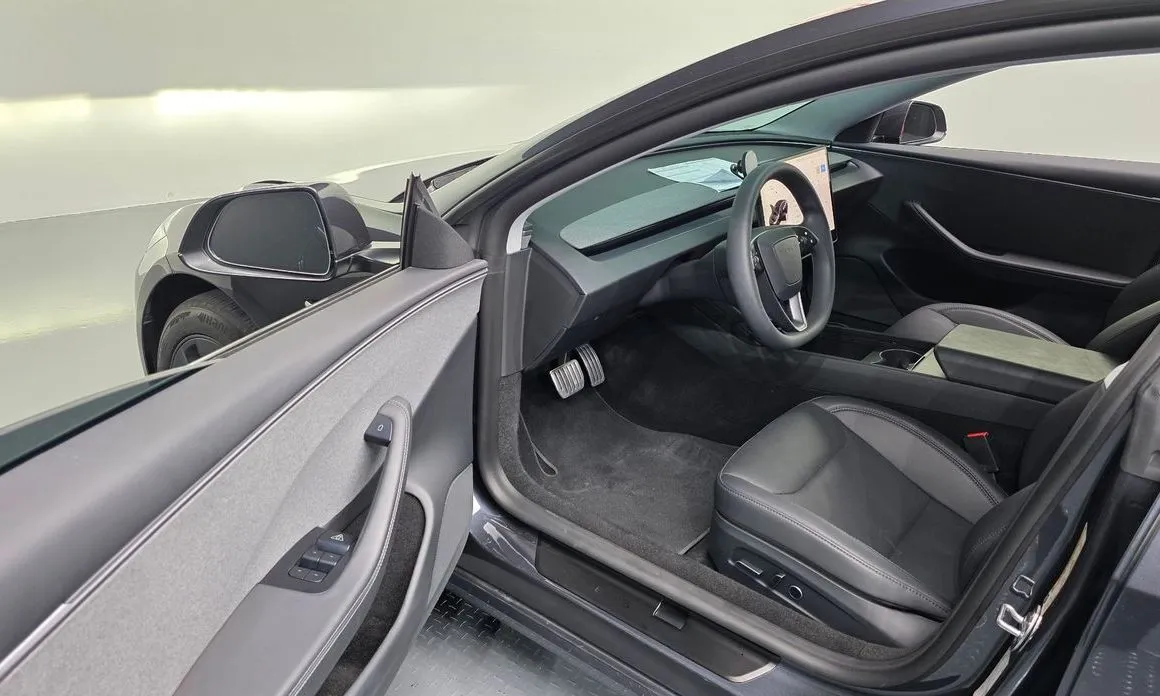 Tesla Model 3 — фото 9